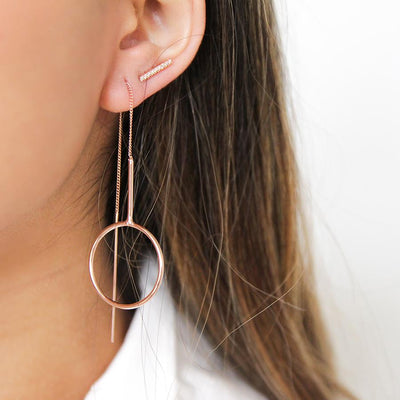 Gold drop earring with chain and hoop detail