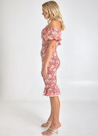 Rose print midi dress on blonde model