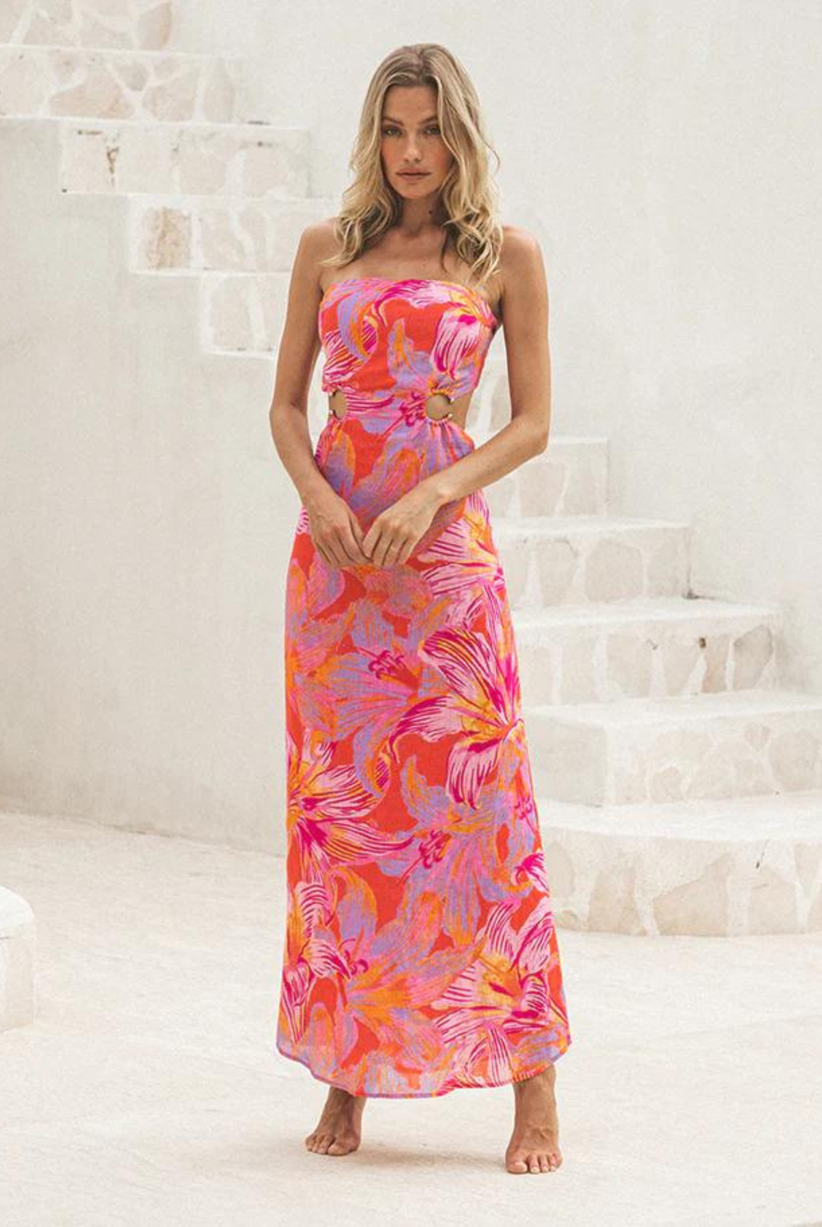 Strapless Avalyn Maxi Dress with cut outs at the side and a back tie