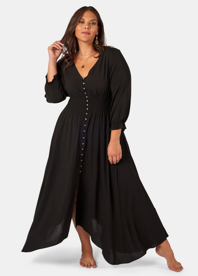 Model wearing the button through brown sugar dress in black 