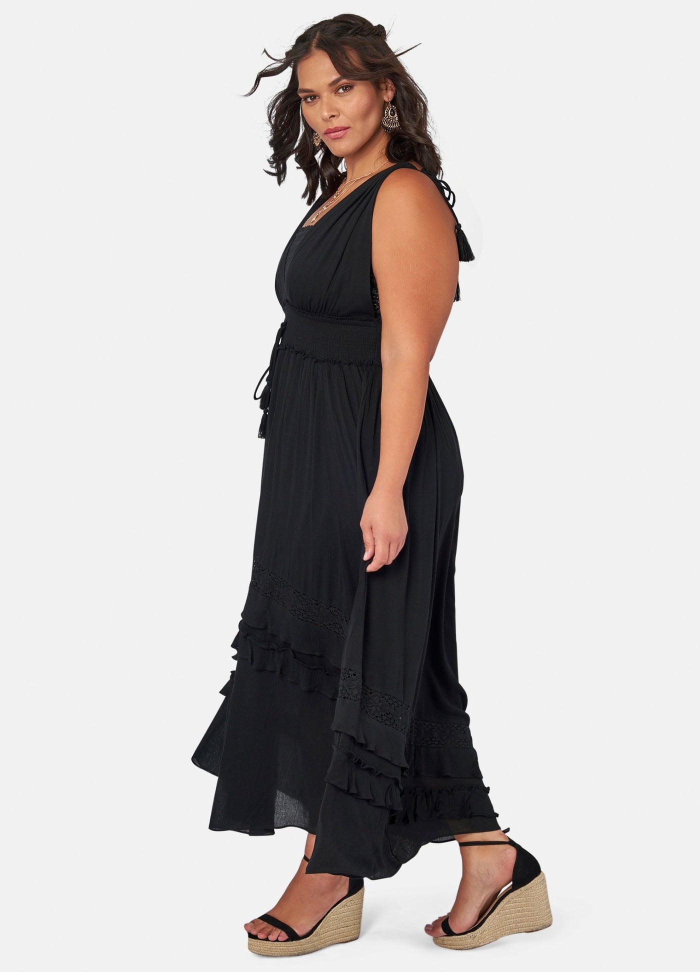 Model wearing the black sunbeam maxi dress