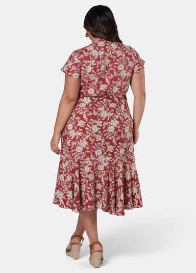 Model wearing red dress from back