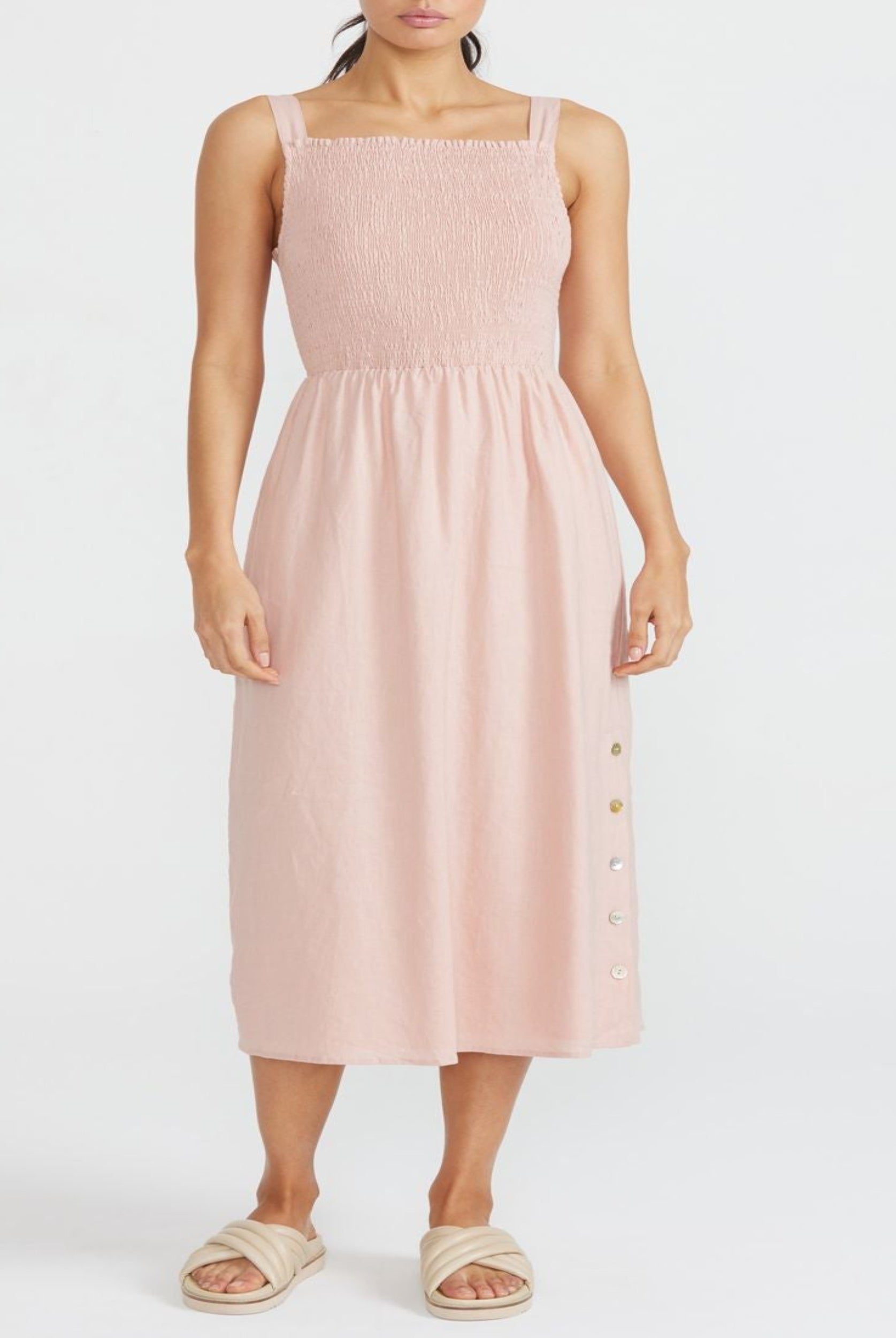 Model wearing pink midi dress