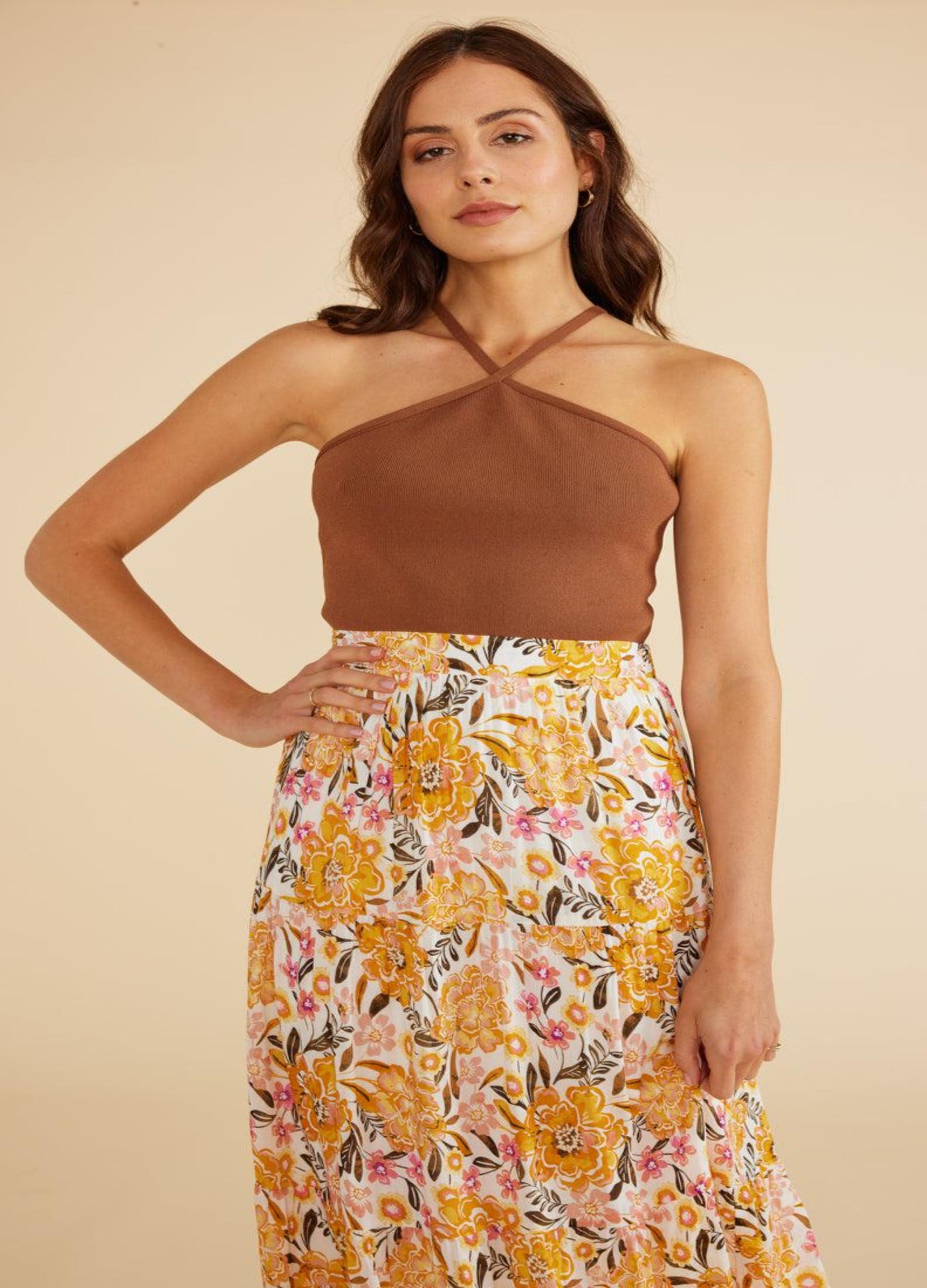 Model wearing yellow floral print midi skirt with elasticated waistband from Australian Brand Mink Pink