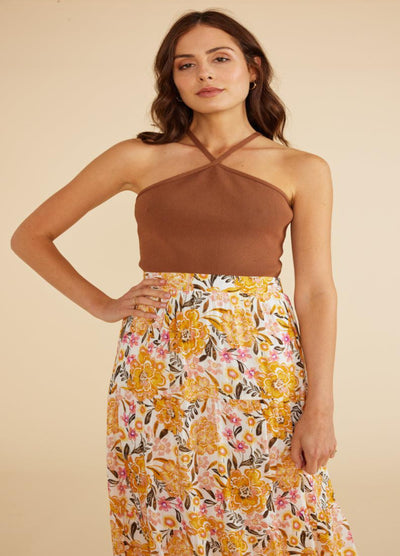Model wearing yellow floral print midi skirt with elasticated waistband from Australian Brand Mink Pink