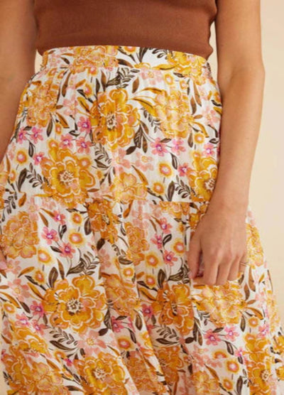 Model wearing yellow floral print midi skirt with elasticated waistband from Australian Brand Mink Pink
