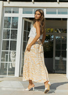 Brunette Model wearing the Finlay Print Maxi Skirt