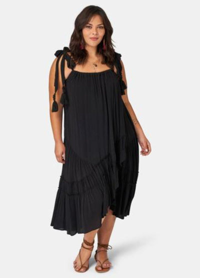 Brunette model wearing black maxi dress