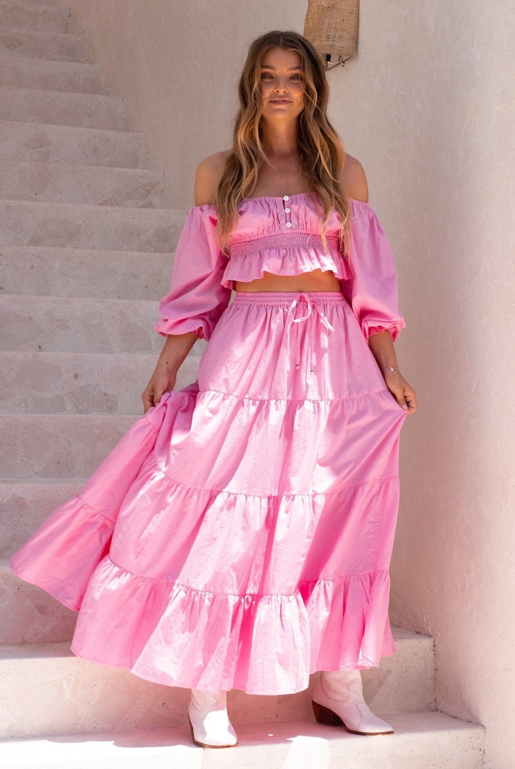 Model wearing pink maxi skirt