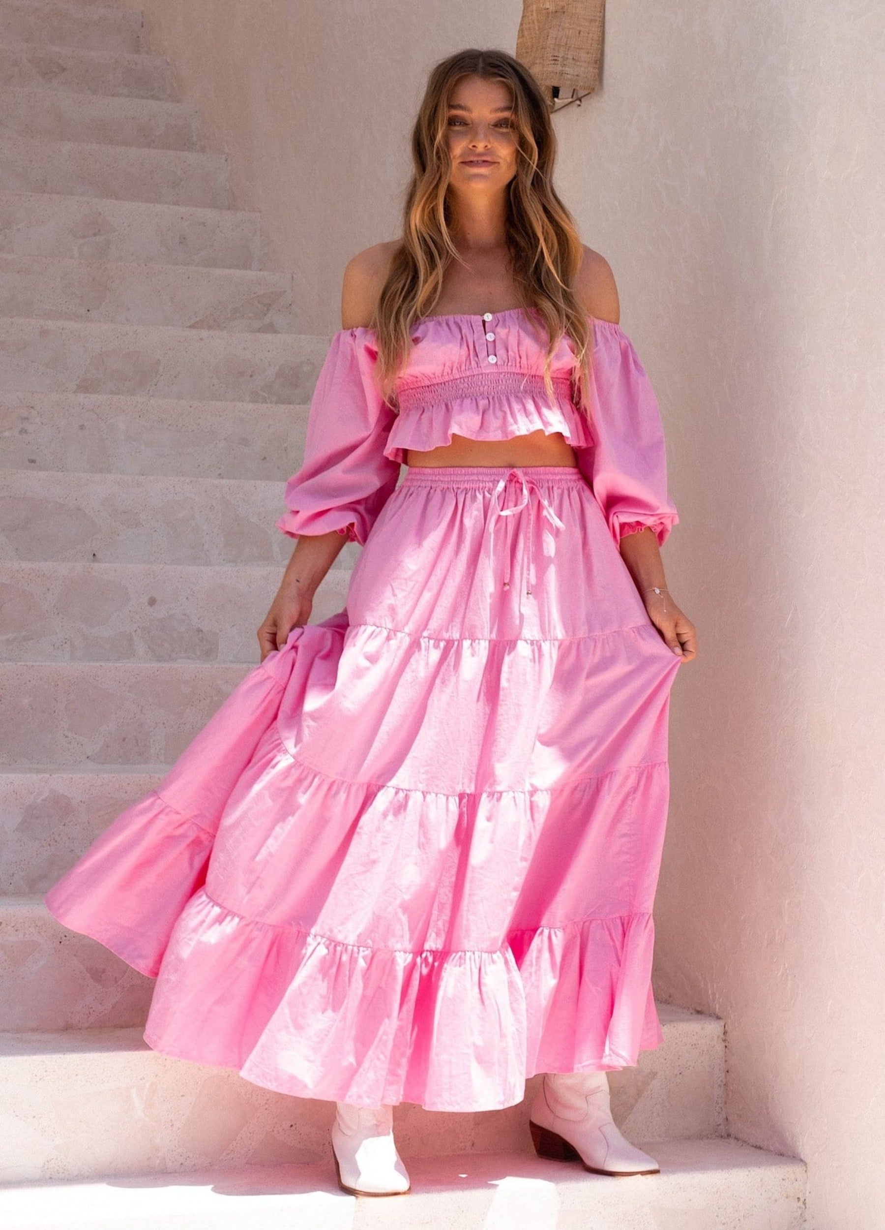 Model wearing pink maxi skirt