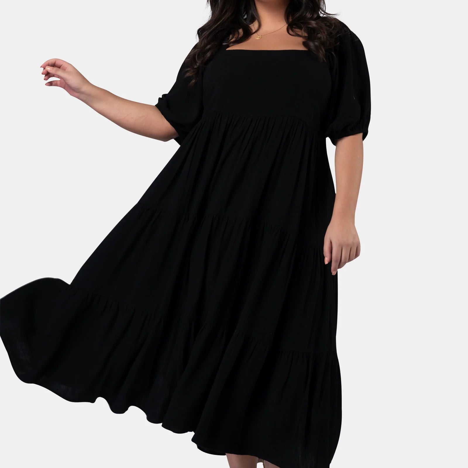 Model wearing the black isabella dress
