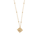 Gold necklace with coin drop detail