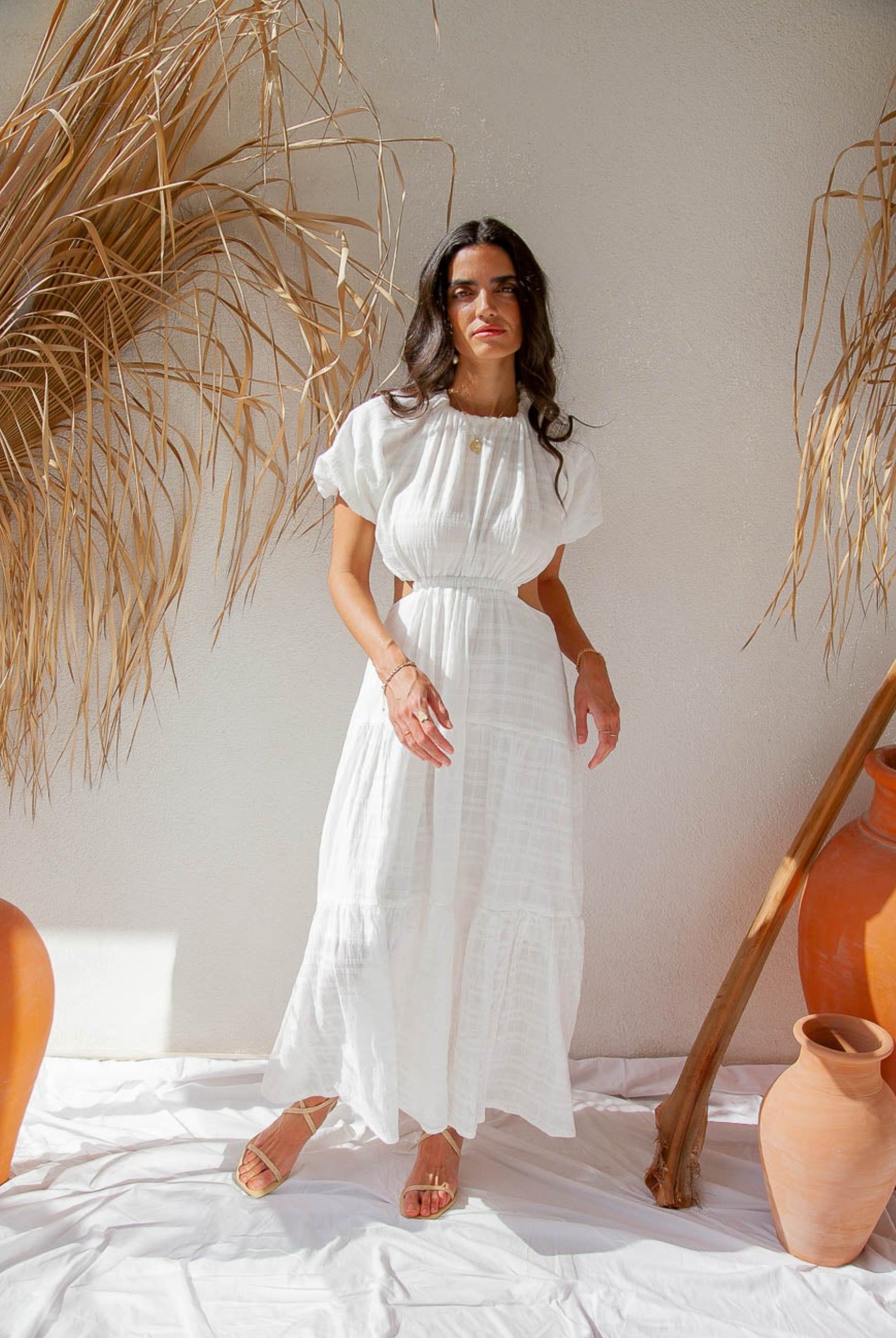 Woman wearing white maxi dress