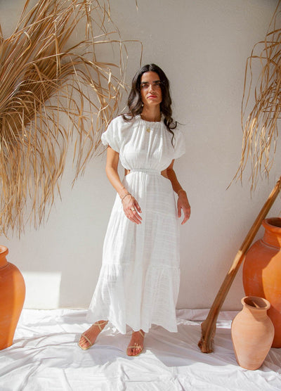Woman wearing white maxi dress