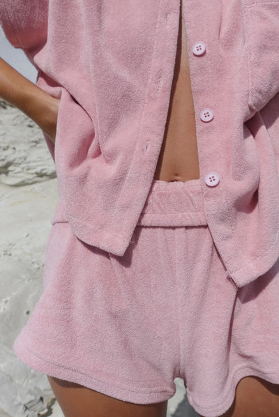 Model wearing dusty pink terry towelling set