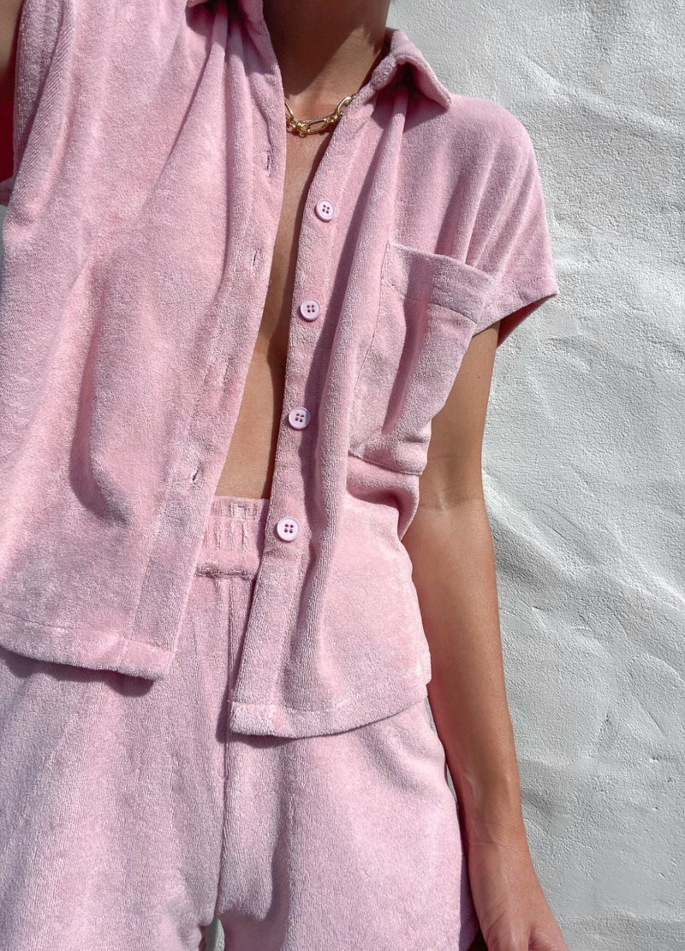 Model wearing dusty pink terry towelling set