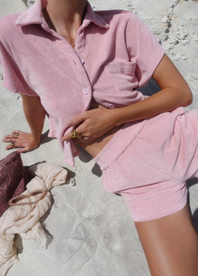 Model wearing dusty pink terry towelling set