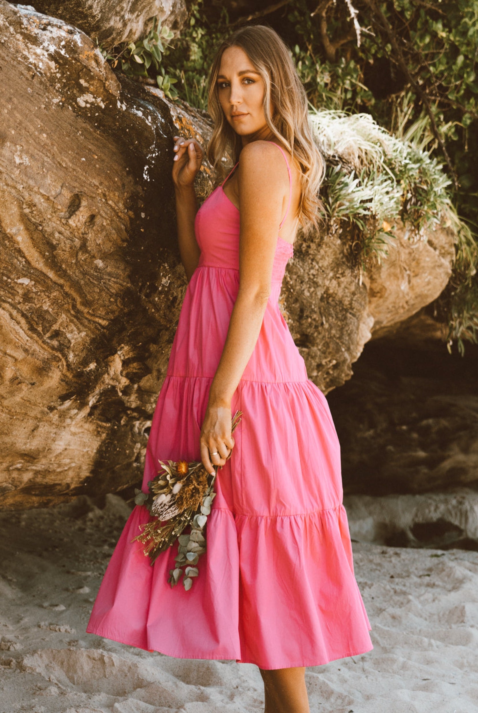 Model wearing pink Matilda Midi Dress 