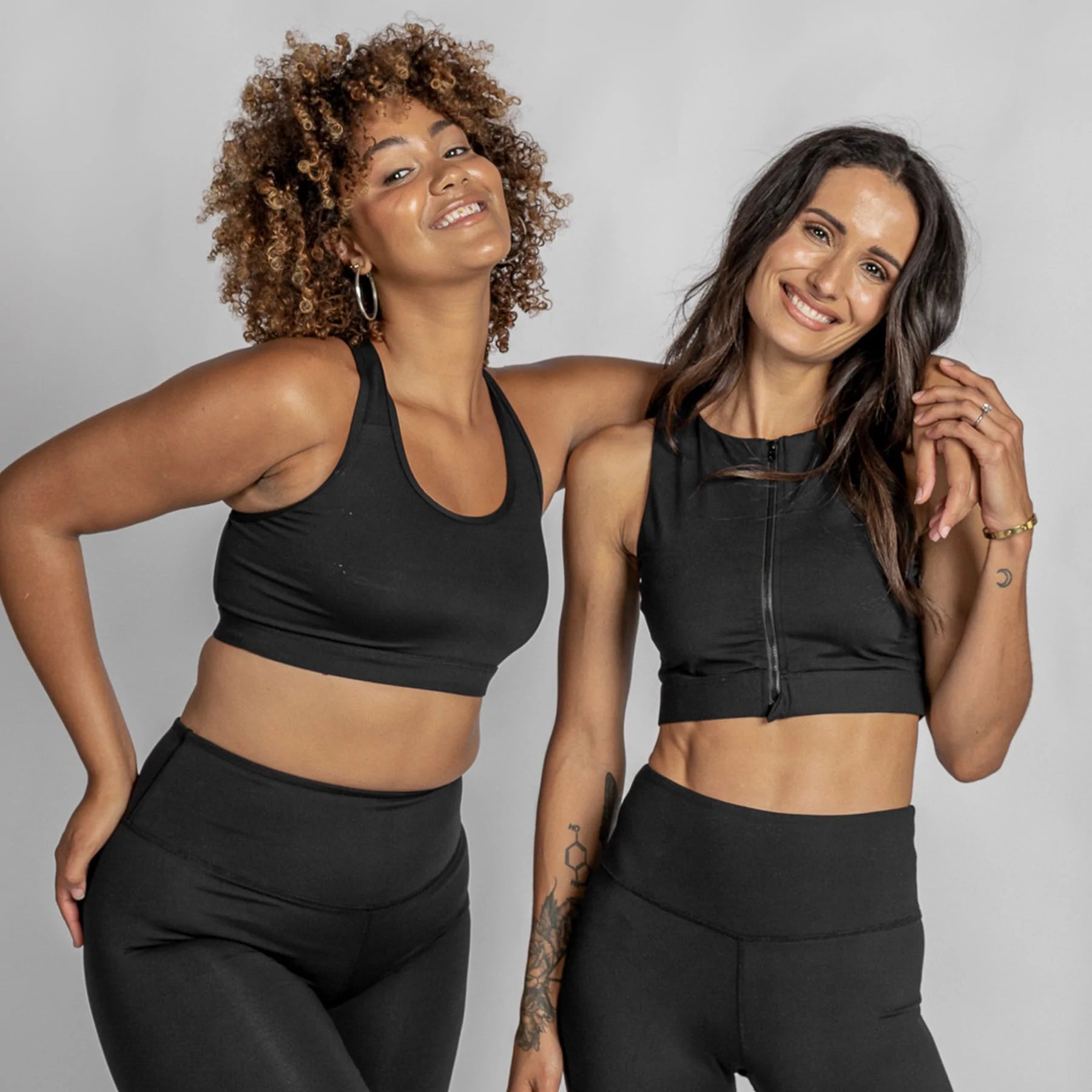 Black active crop top with centre front zip from Infamous Active