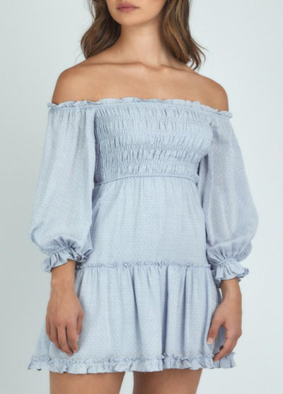 Brunette Model wearing the Mia bodice dress in pale blue