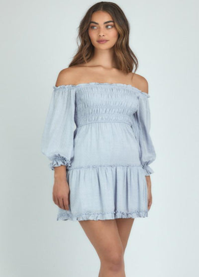 Brunette Model wearing the Mia bodice dress in pale blue