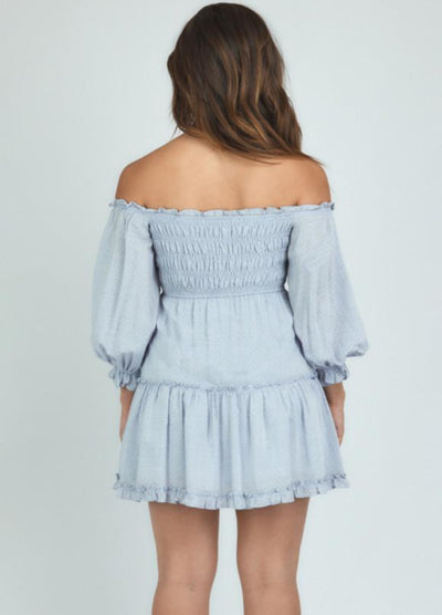 Brunette Model wearing the Mia bodice dress in pale blue