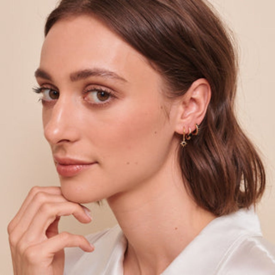 Model wearing the Zara Sleepers in her ear